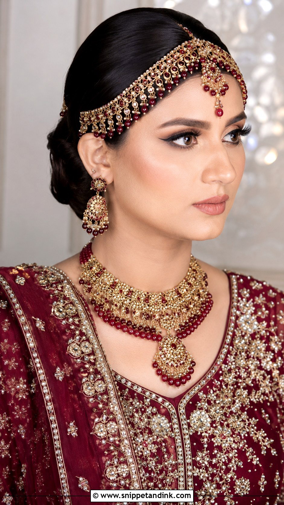 Sleek Bun With Bold Matha Patti - Snippet and Ink - 20 Pakistani Barat Bride Hairstyles