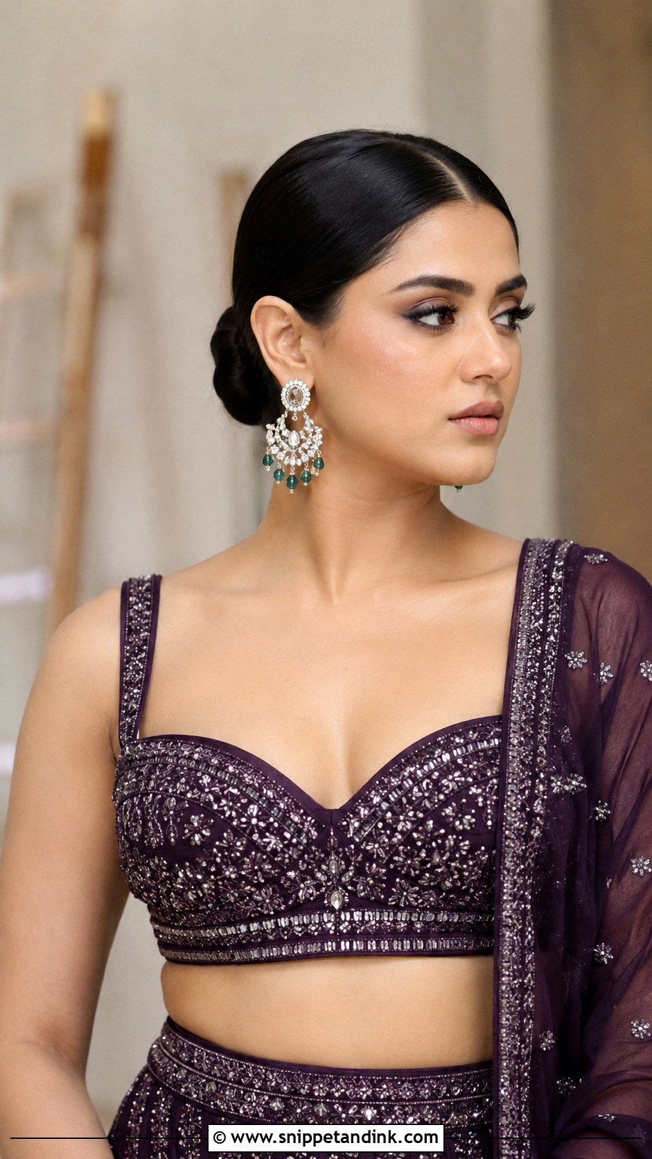 Sleek Bun With Center Part - Snippet and Ink - 25 Hairstyles for Marriage Function
