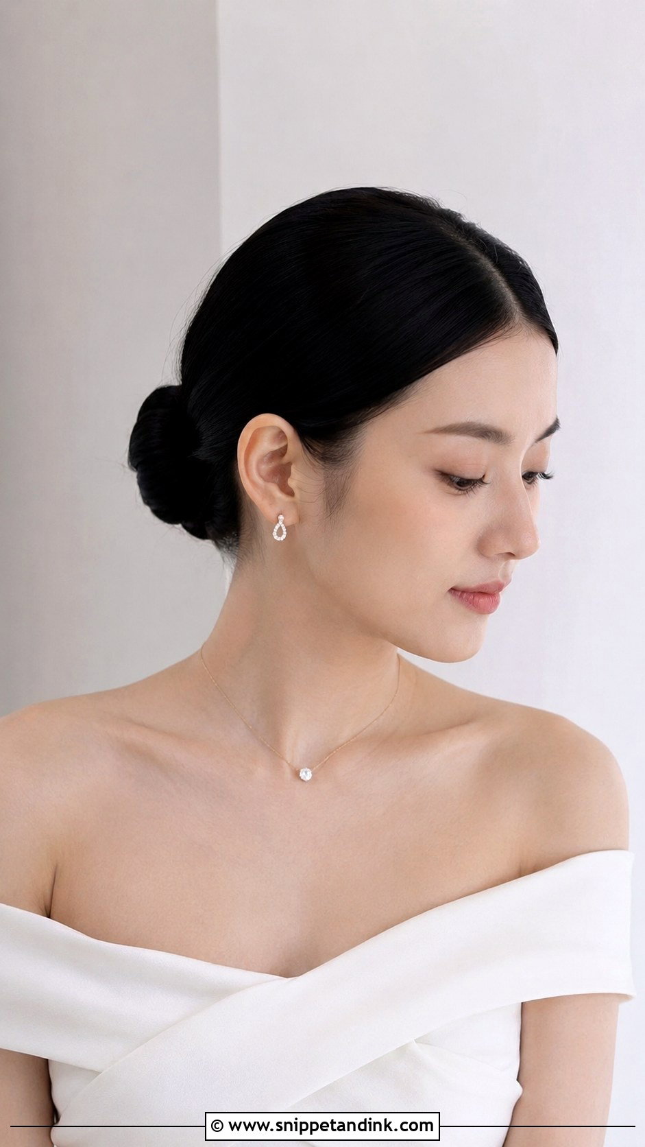 Sleek Bun With Middle Part - Snippet and Ink - 25 Simple Engagement Hairstyles