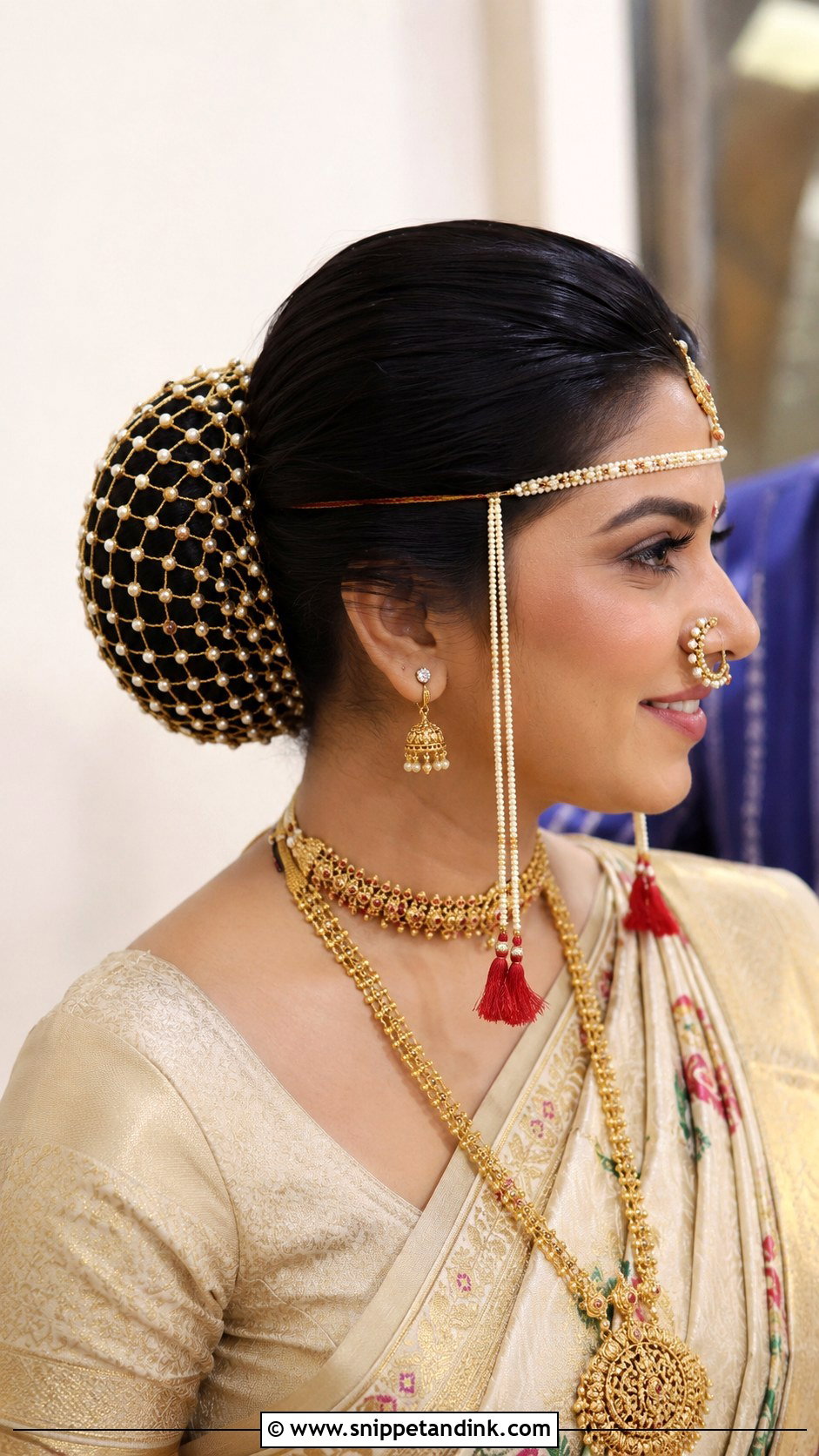 Sleek Bun With Net Jaali - Snippet and Ink - 25 Marathi Bride Hairstyle Ideas