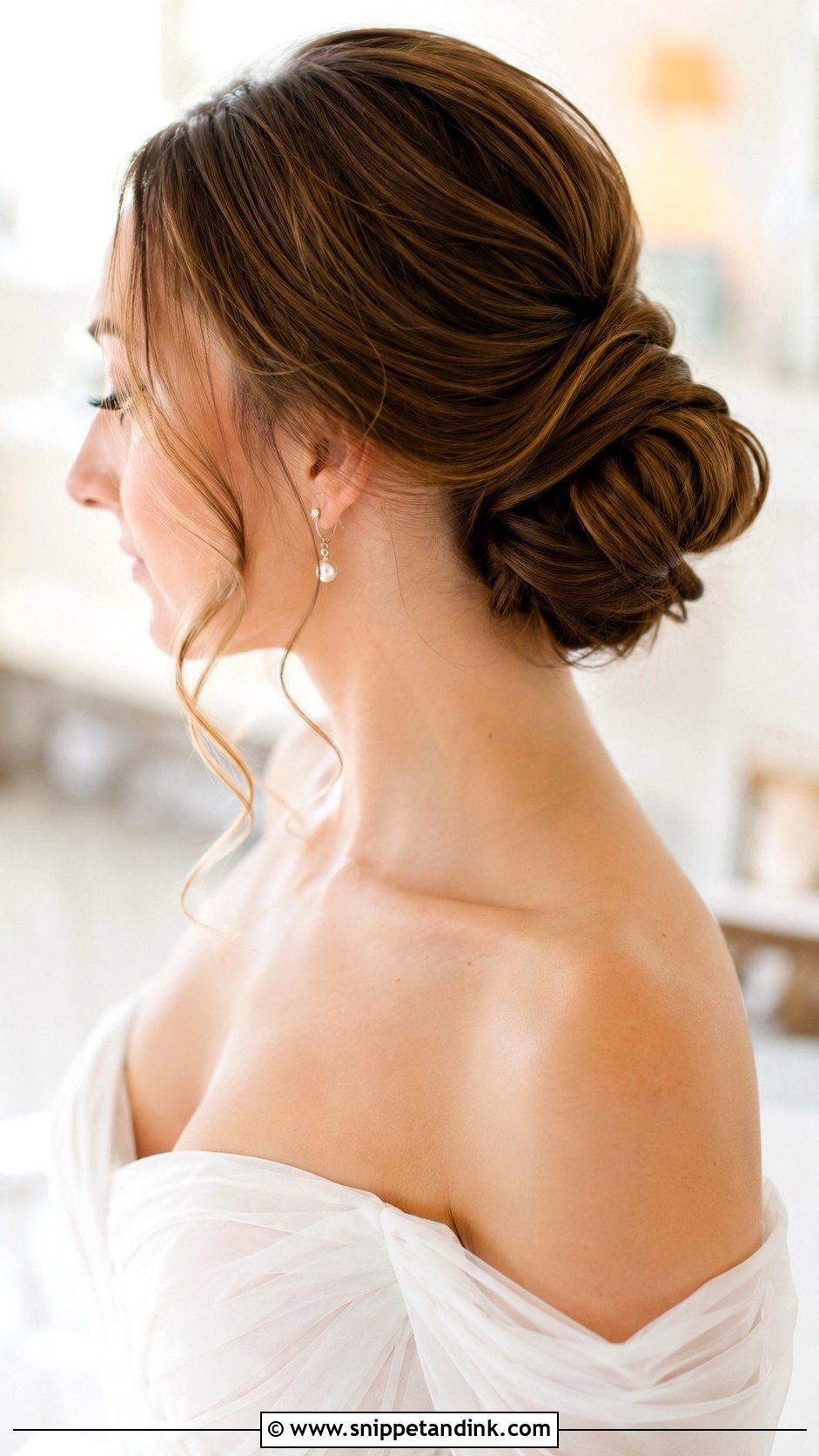 Sleek Bun With Soft Side Tendrils - Snippet and Ink - 25 Sleek Bun Wedding Hair Ideas