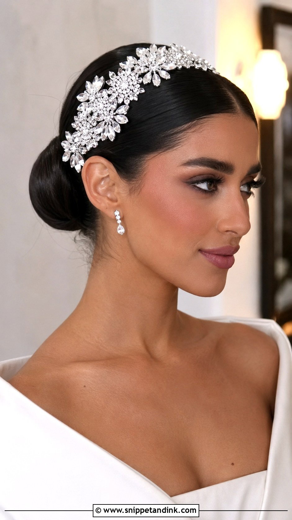 Sleek Bun With Statement Headpiece - Snippet and Ink - 20 Arab Wedding Hairstyles