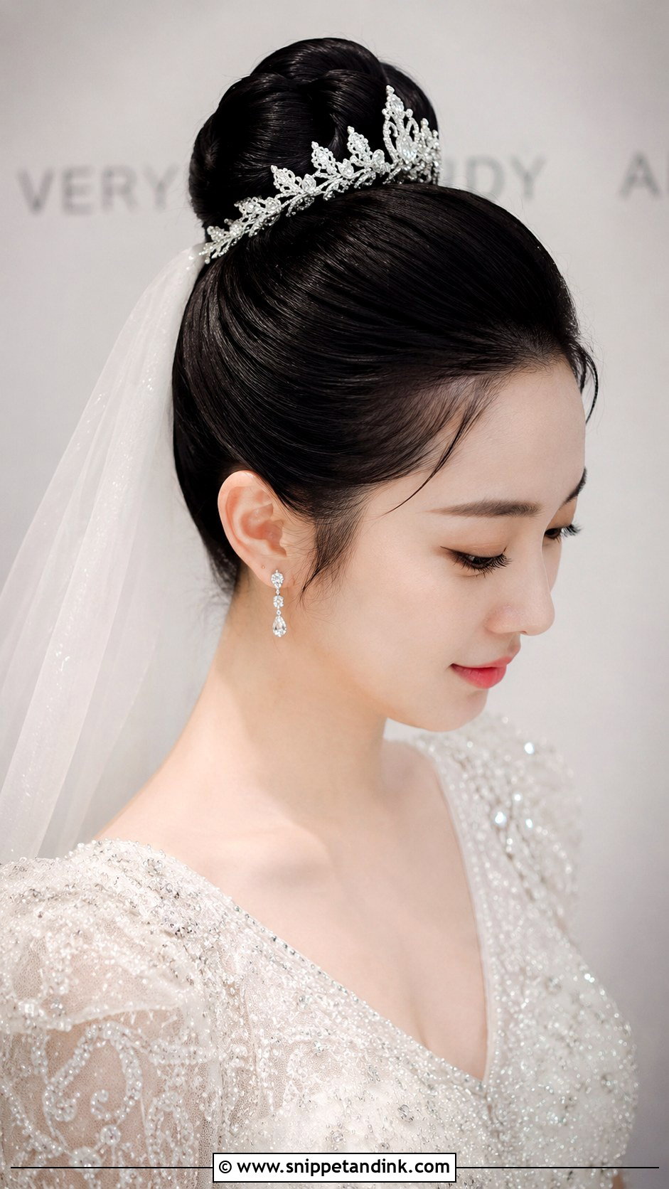 Sleek Bun With Tiara - Snippet and Ink - 25 Wedding Tiara Hairstyles