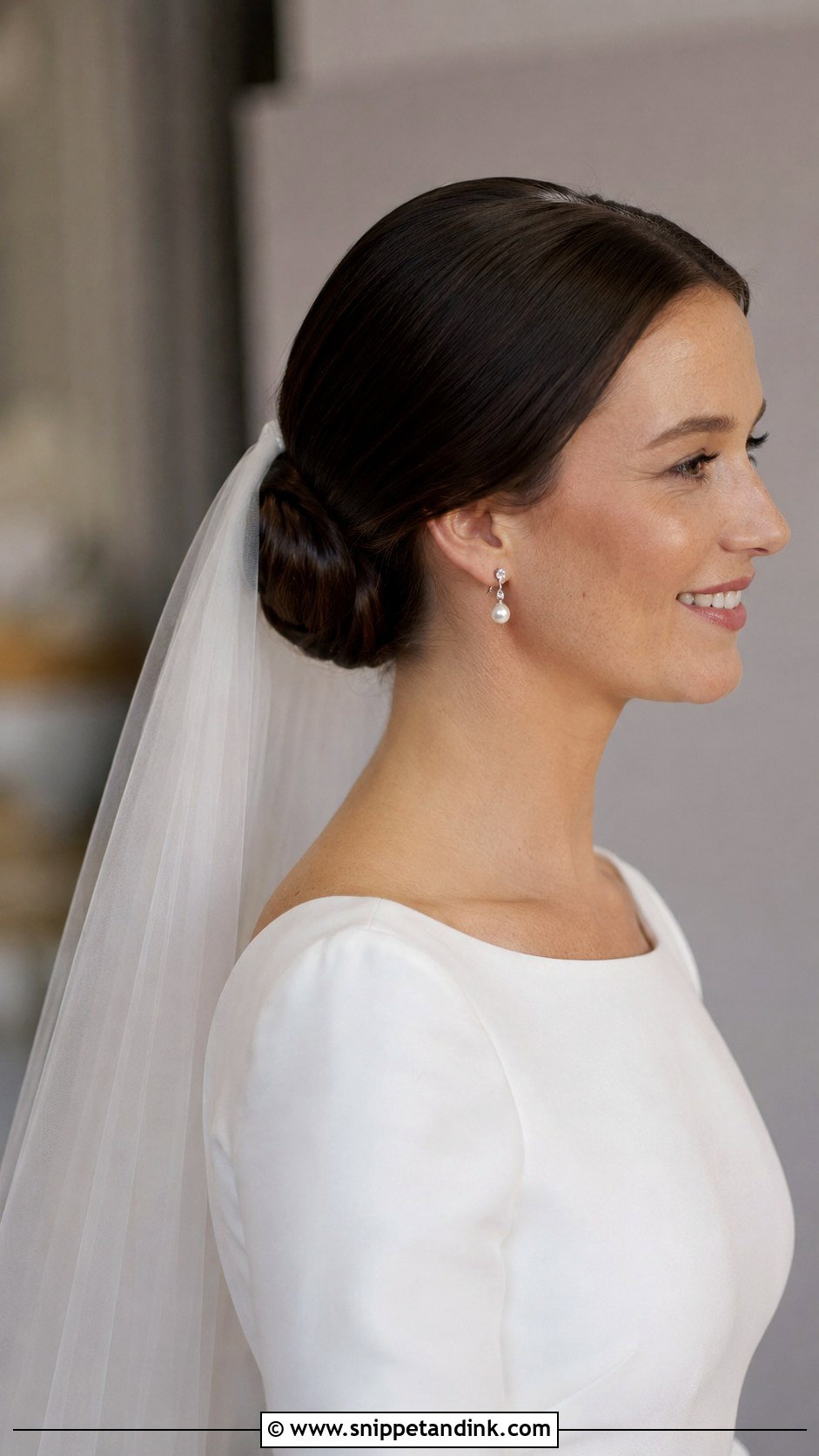Sleek Bun With Veil - Snippet and Ink - 20 Sleek Wedding Hairstyles