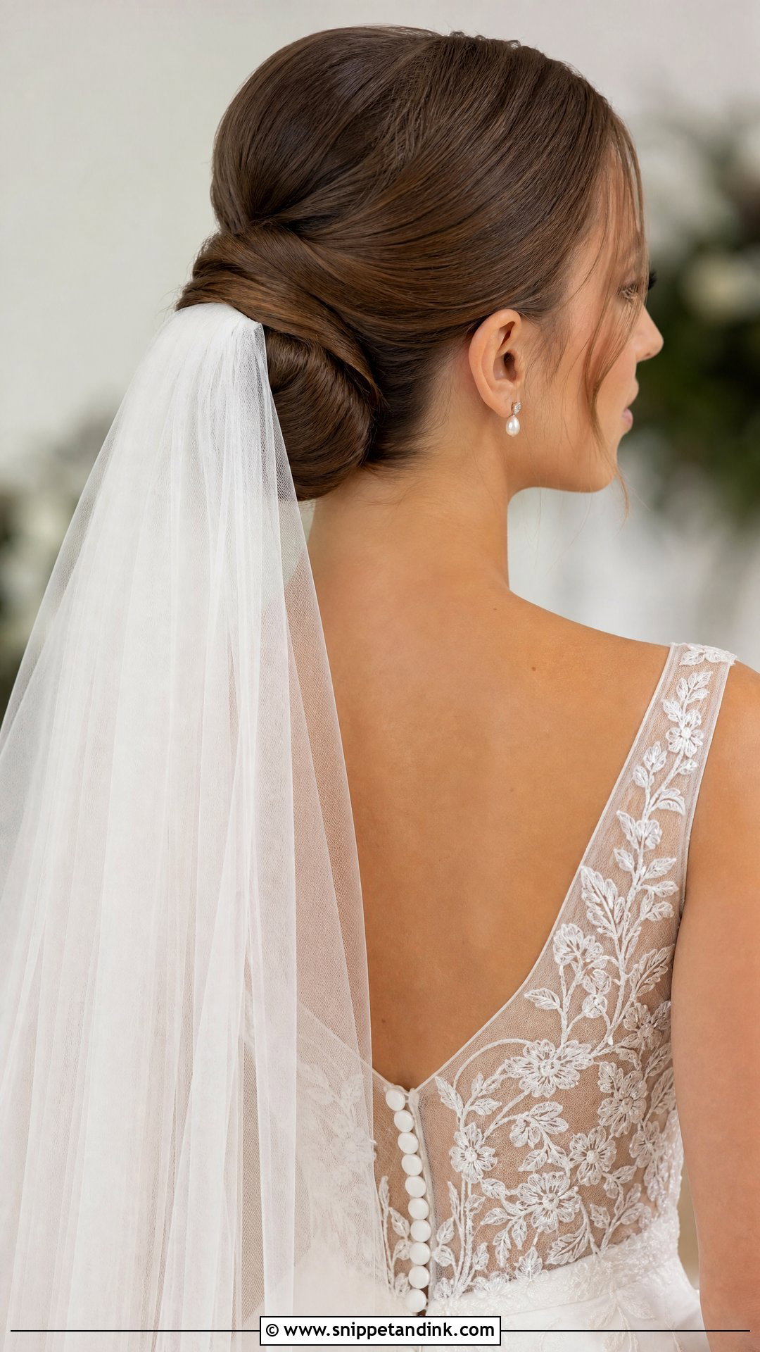 Sleek Bun With Veil - Snippet and Ink - 20 Old Money Wedding Hair Ideas