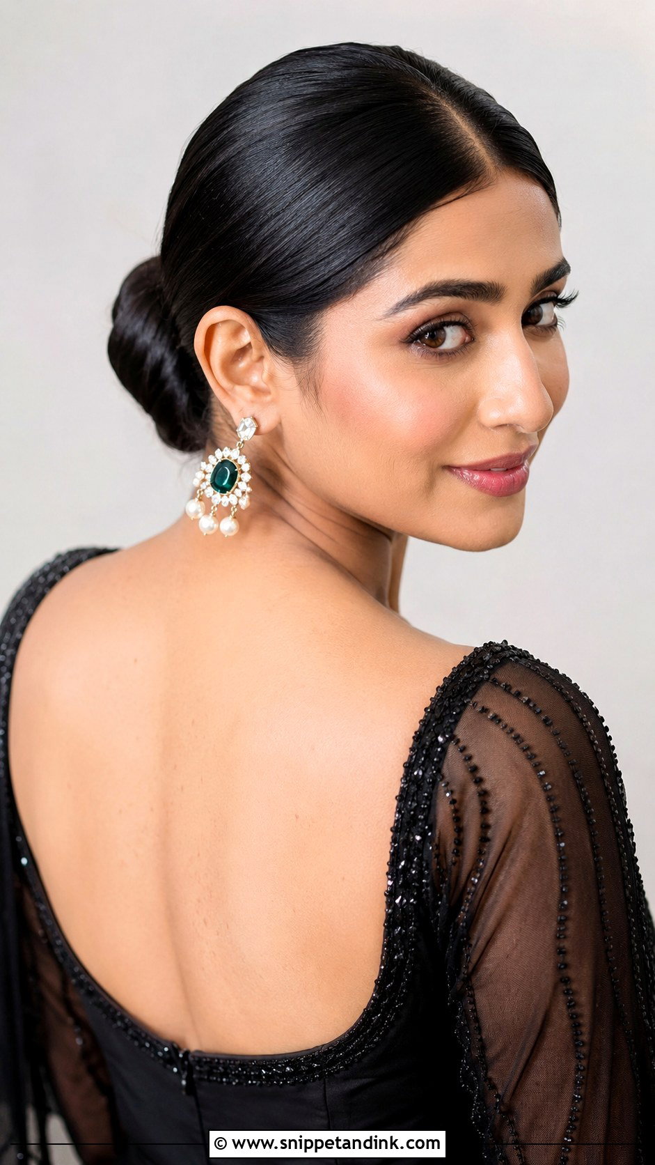 Sleek Center Part Bun - Snippet and Ink - 20 Black Tie Wedding Guest Hairstyles