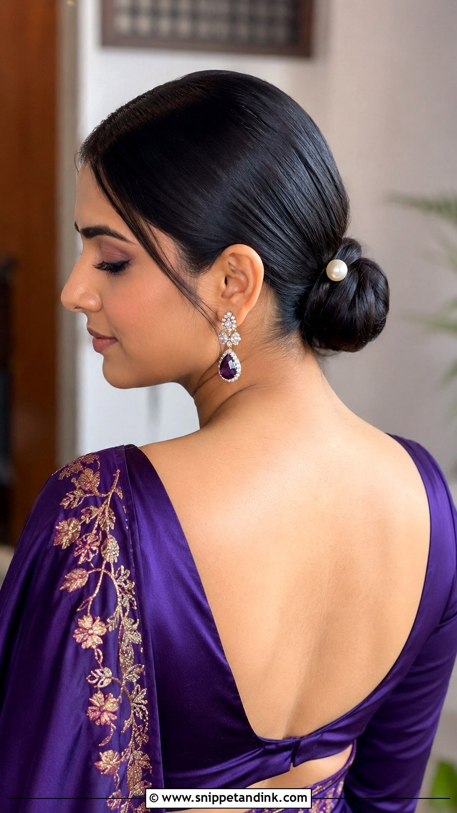 Sleek Center Part Low Bun - Snippet and Ink - 25 Shaadi Hairstyles