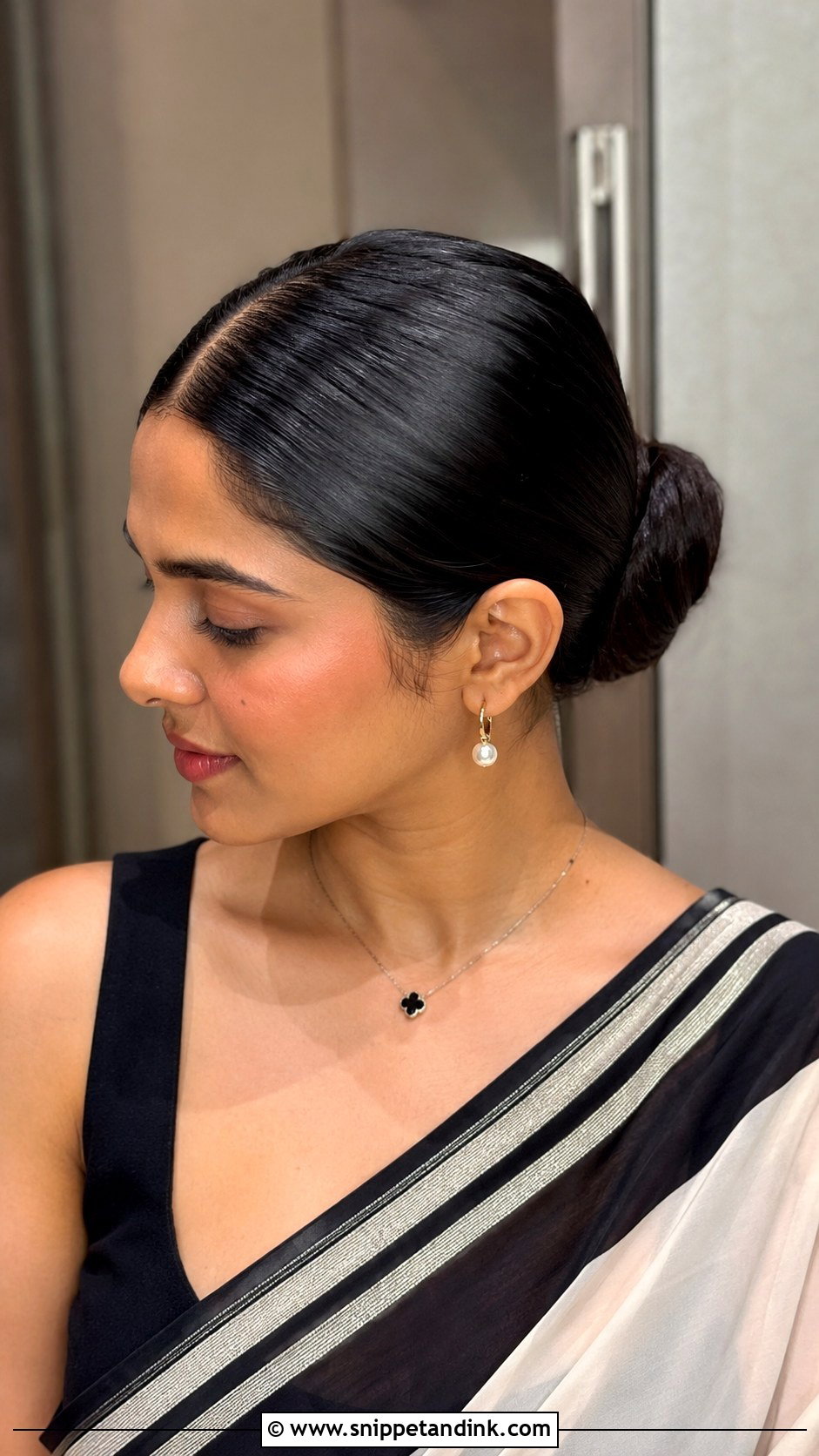 Sleek Center Parted Bun - Snippet and Ink - 20 Simple Hairstyles for Indian Wedding