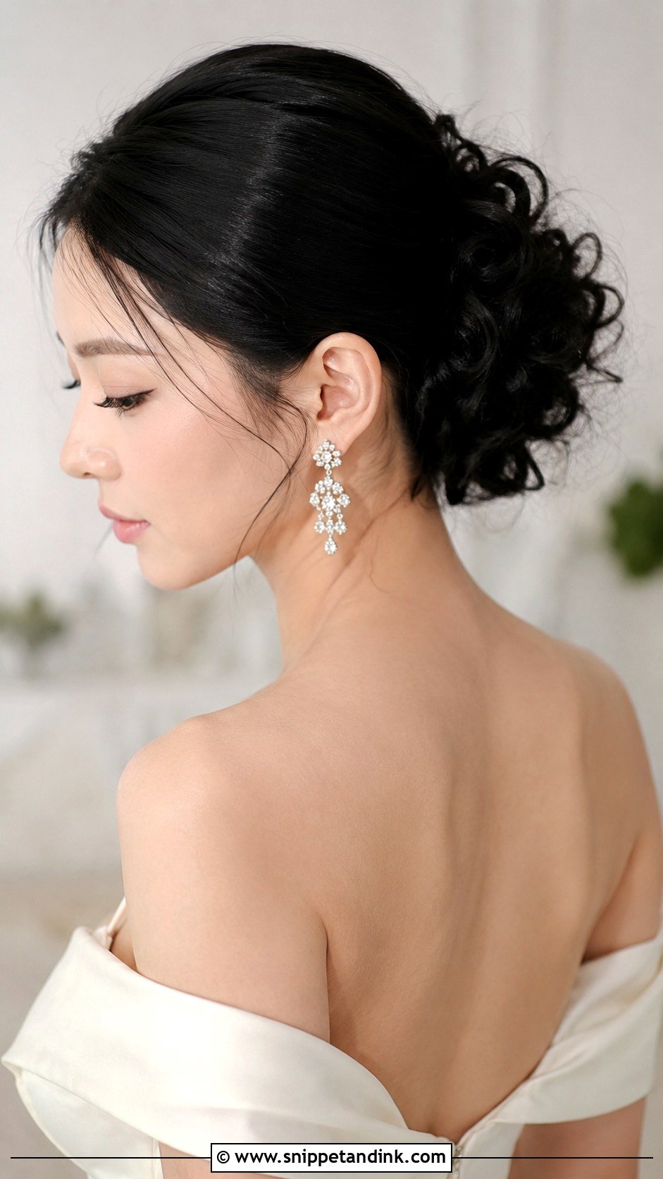 Sleek Curly Bridal Bun - Snippet and Ink - 30 Curly Hair Bride Ideas