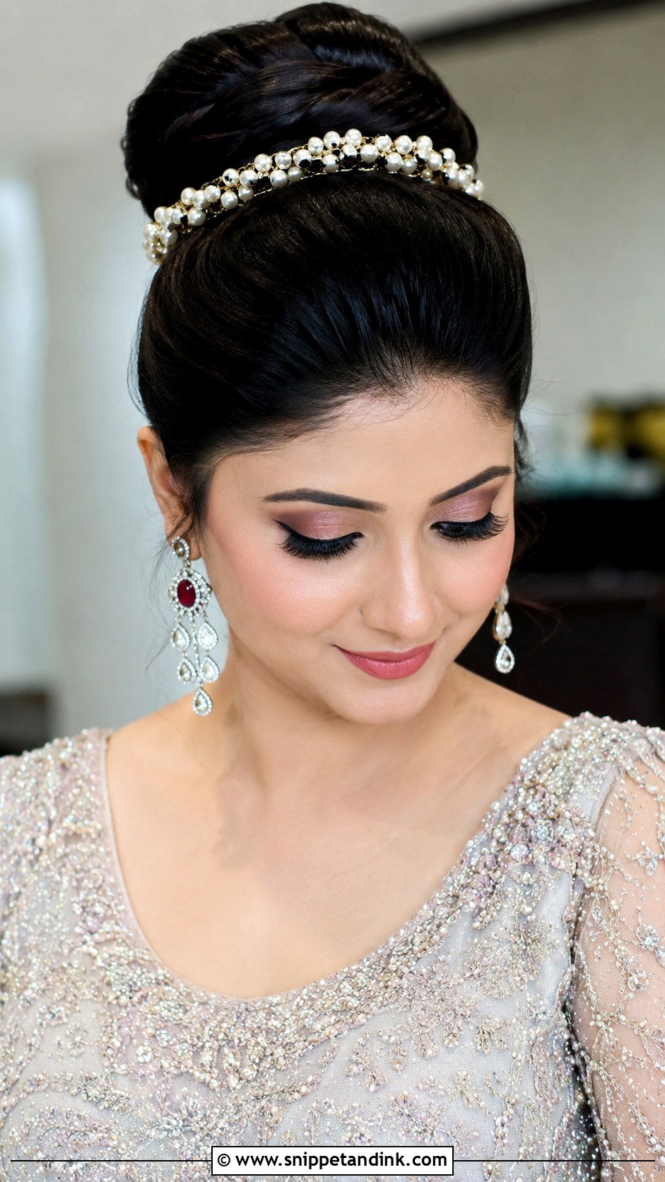 Sleek Front Puff With High Bun - Snippet and Ink - 30 Indian Wedding Front Hairstyles
