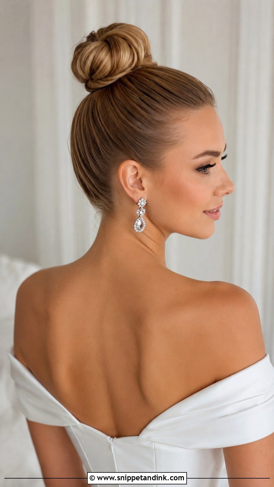 Sleek High Bun - Snippet and Ink - 20 Simple Updo Wedding Hairstyles
