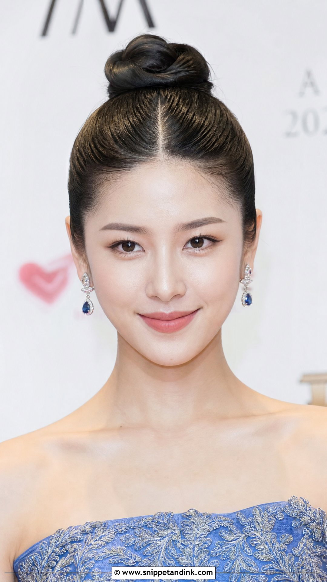 Sleek High Bun - Snippet and Ink - 20 Wedding Guest Hair Long Ideas