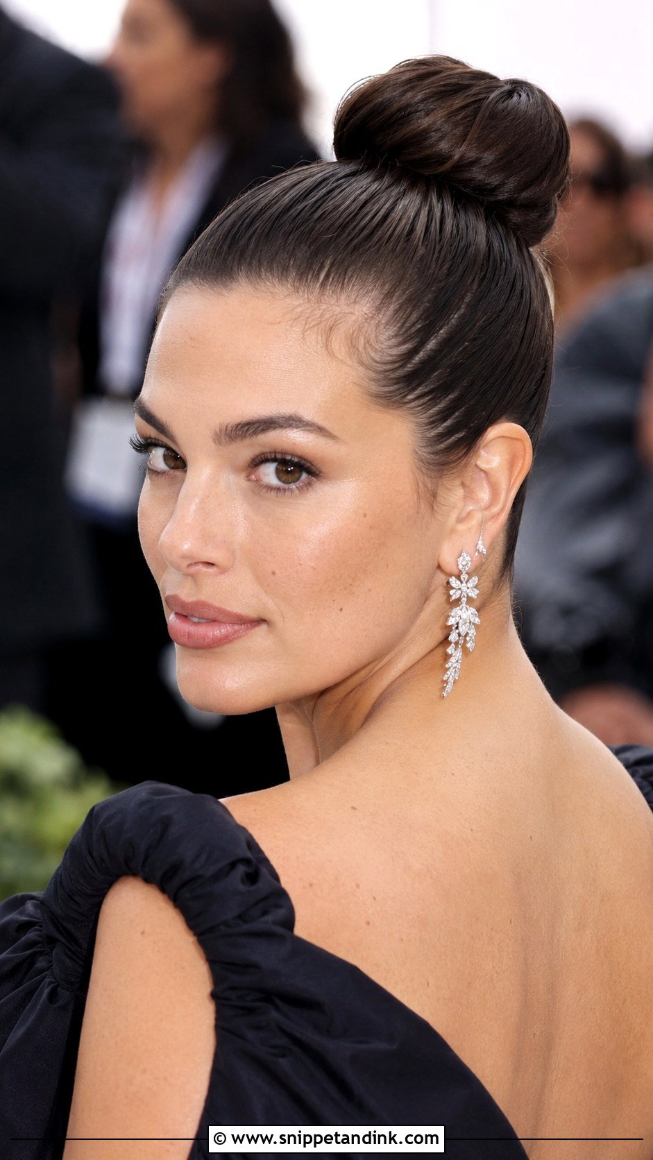 Sleek High Bun - Snippet and Ink - 35 Bridal Bun Ideas