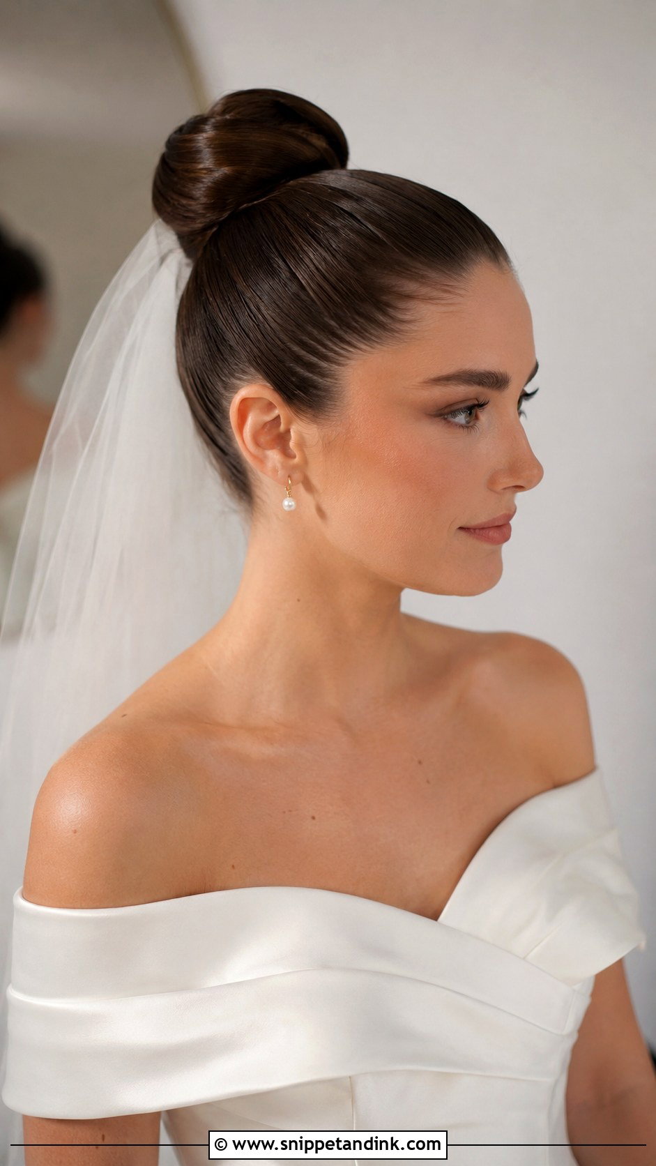 Sleek High Bun Wedding Hairstyle - Snippet and Ink - 25 High Bun Wedding Hairstyles