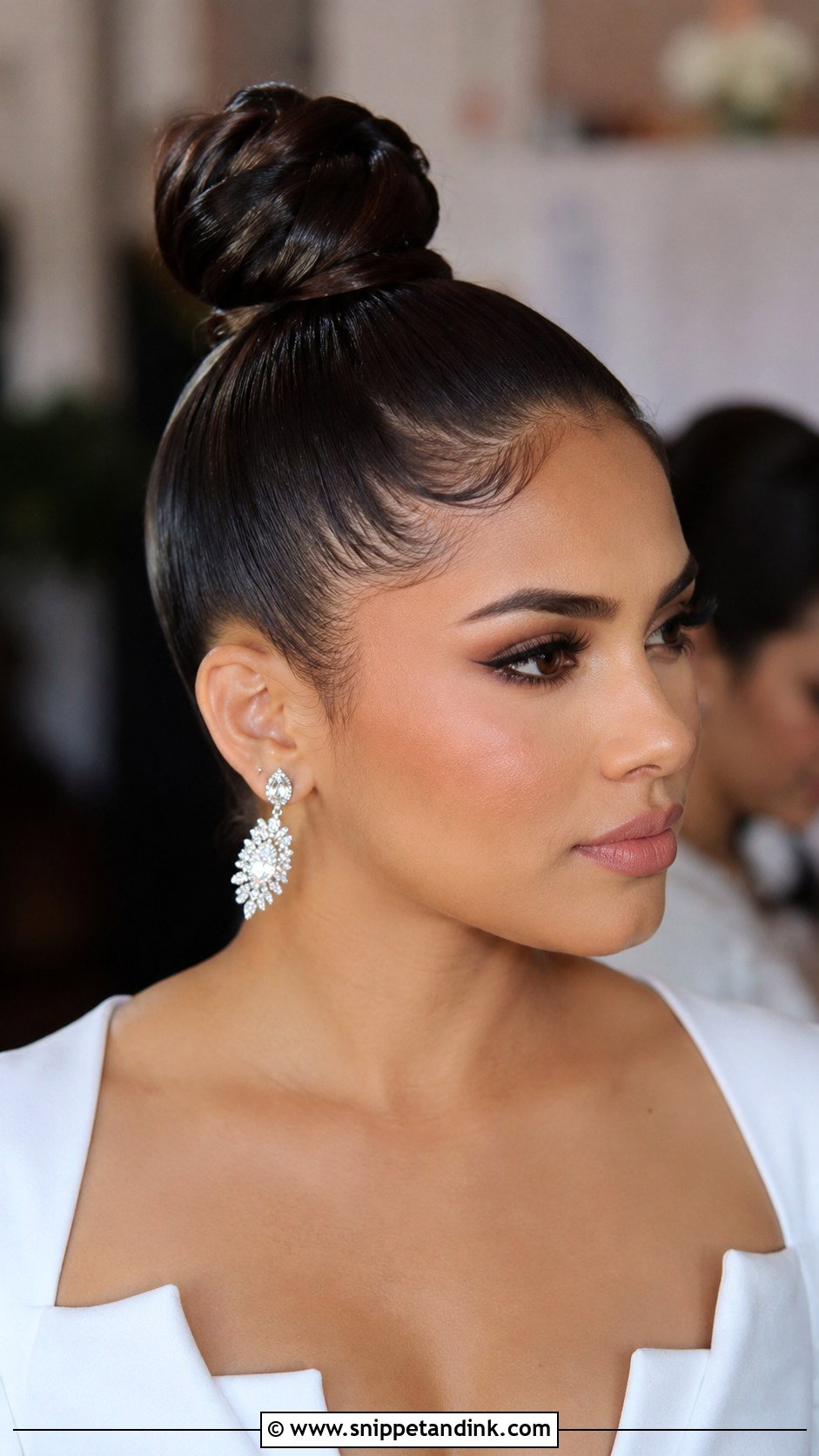 Sleek High Bun With Baby Hairs - Snippet and Ink - 30 High Bun Wedding Hair Ideas