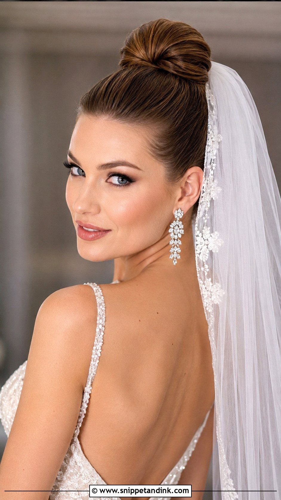Sleek High Bun With Cathedral Veil - Snippet and Ink - 25 Cathedral Veil Hairstyle Ideas