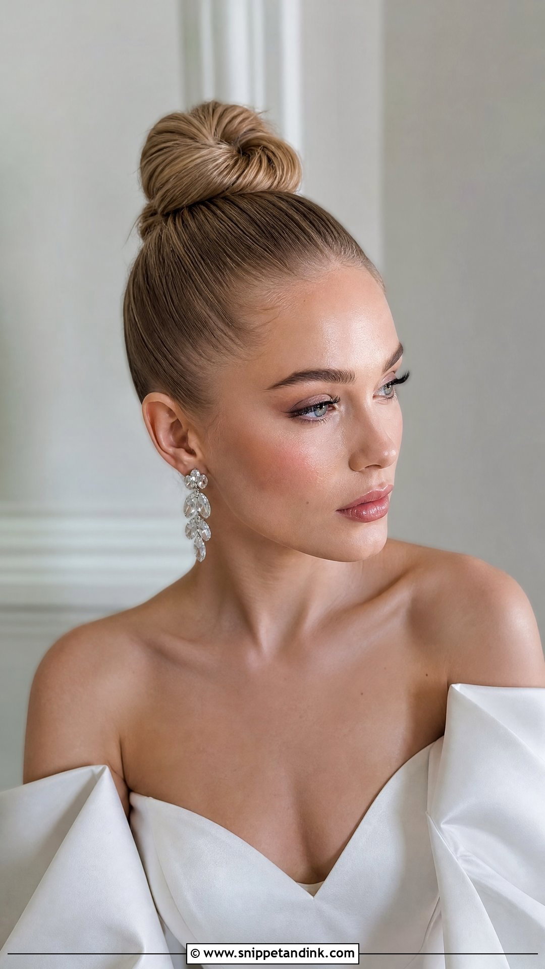 Sleek High Bun With Sleek Edges - Snippet and Ink - 20 Sleek Wedding Updo Ideas