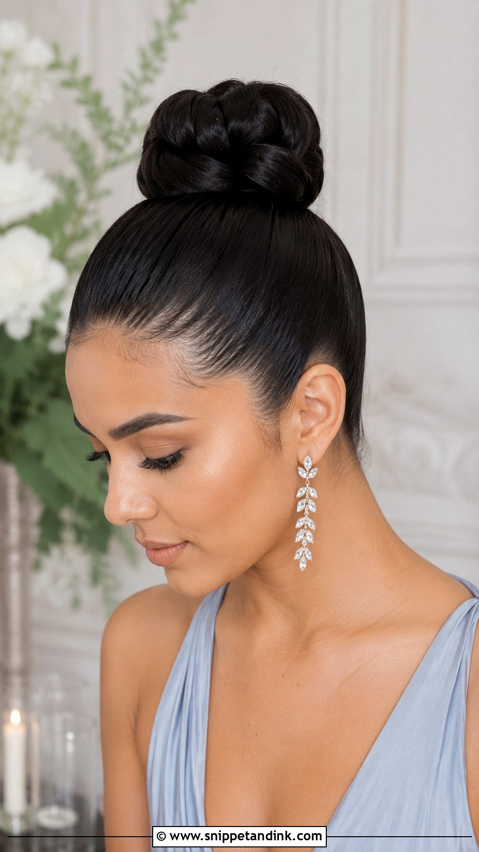 Sleek High Bun With Sleek Edges - Snippet and Ink - 25 Summer Wedding Guest Hair Ideas