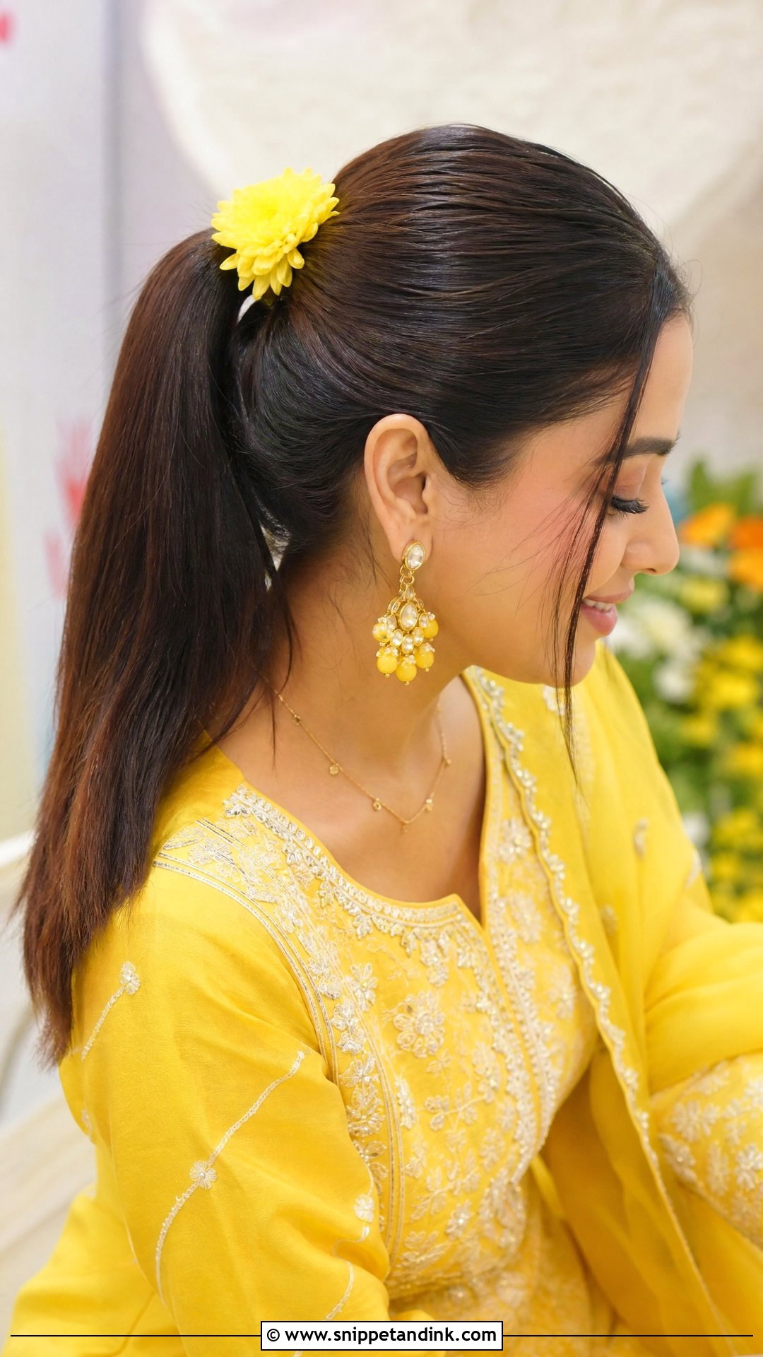 Sleek High Ponytail With Flower Accent - Snippet and Ink - 20 Hairstyle for Haldi Bride Ideas