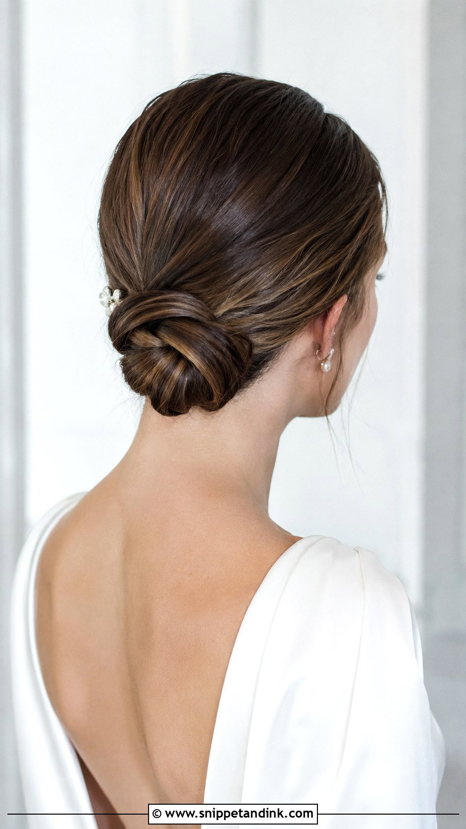 Sleek Knotted Low Bun - Snippet and Ink - 25 Sleek Wedding Hair Ideas