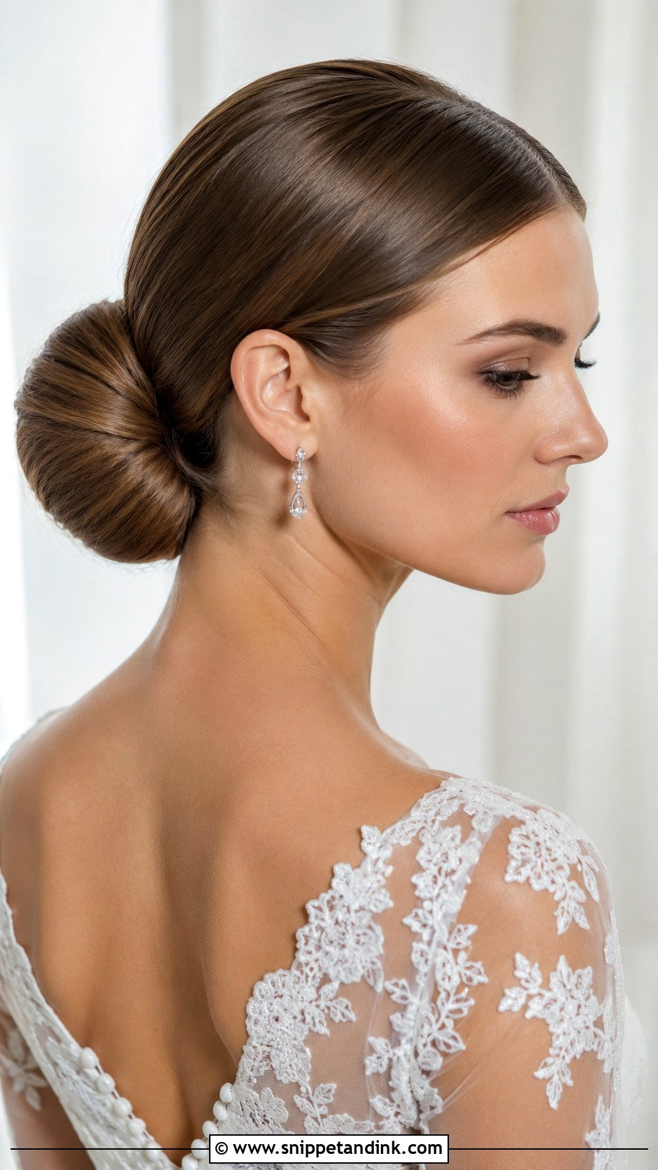 Sleek Low Bun Bridal Hairstyle - Snippet and Ink - 20 Trending Bridal Hairstyles