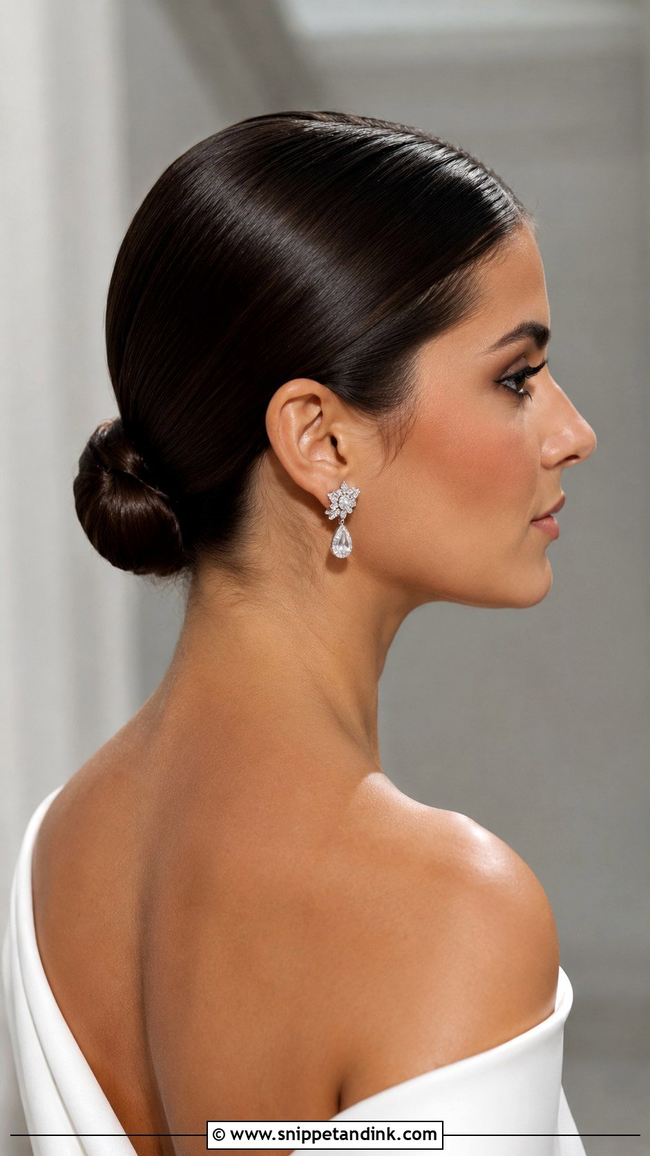 Sleek Low Bun For Modern Brides - Snippet and Ink - 25 Bride Bun Hairstyles