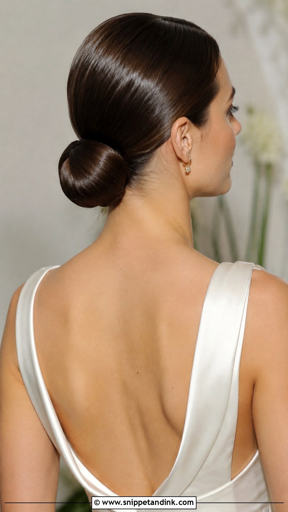 Sleek Low Bun Wedding Hairstyle - Snippet and Ink - 20 Cute Hairstyles for a Wedding
