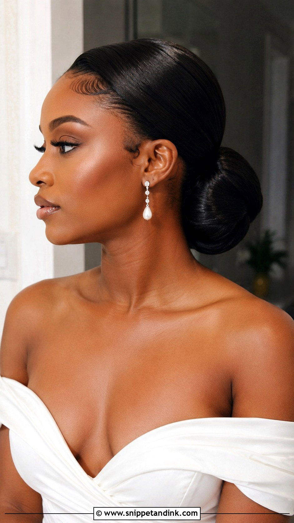 Sleek Low Bun Wedding Updo - Snippet and Ink - 20 Updo Wedding Hairstyles for Black Women