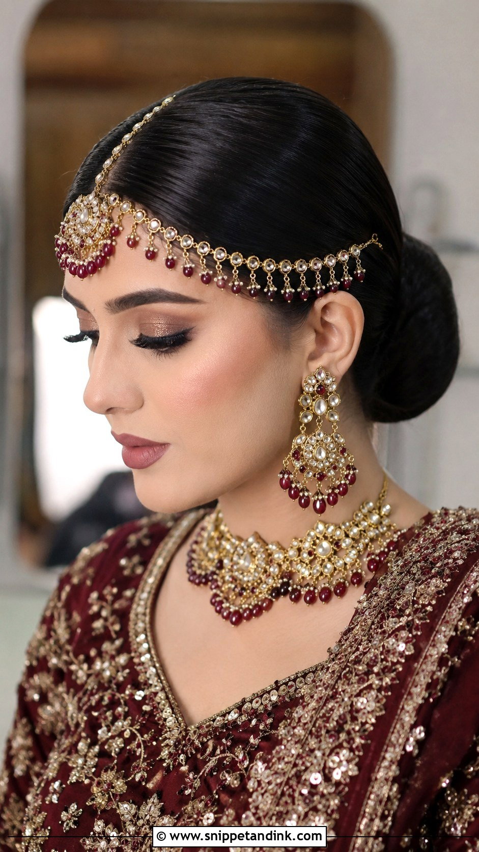 Sleek Low Bun With Center Part - Snippet and Ink - 20 Pakistani Barat Bride Hairstyles