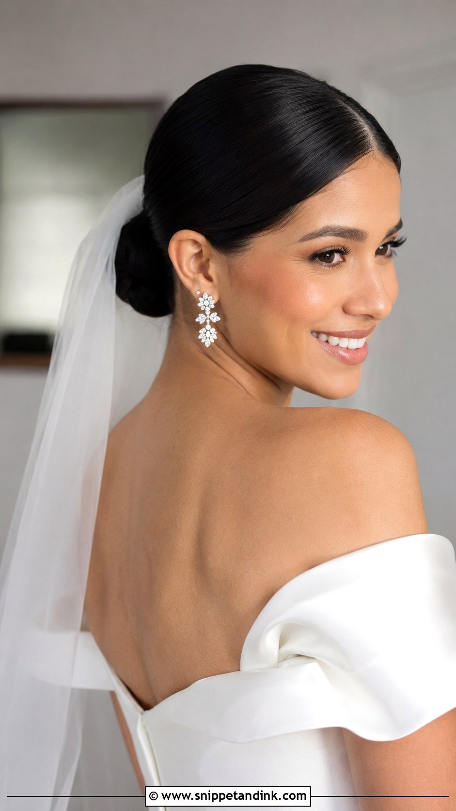 Sleek Low Bun With Center Part - Snippet and Ink - 20 Wedding Hairstyles Dark Hair