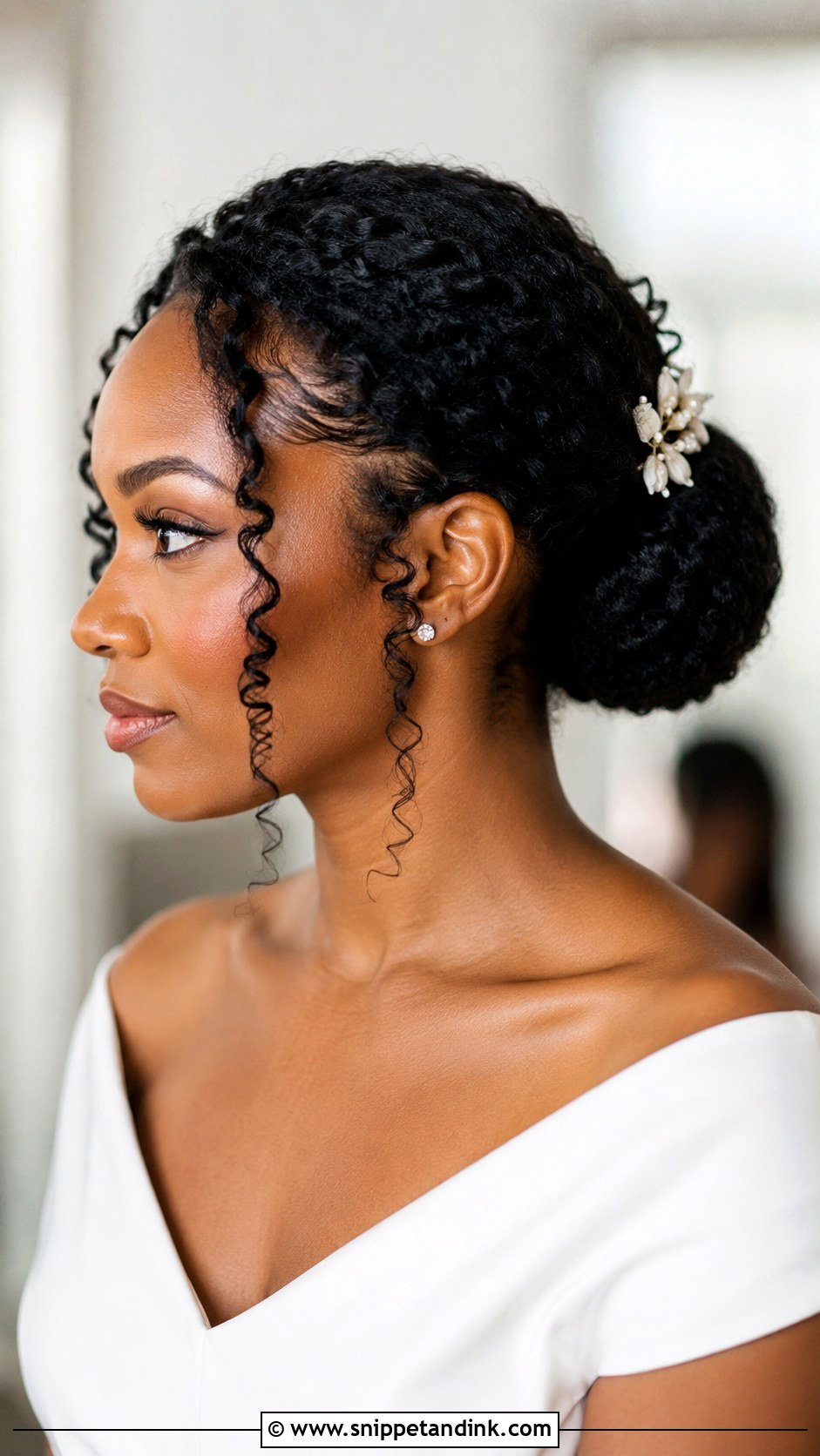 Sleek Low Bun With Coils - Snippet and Ink - 20 Bridal Natural Hairstyles
