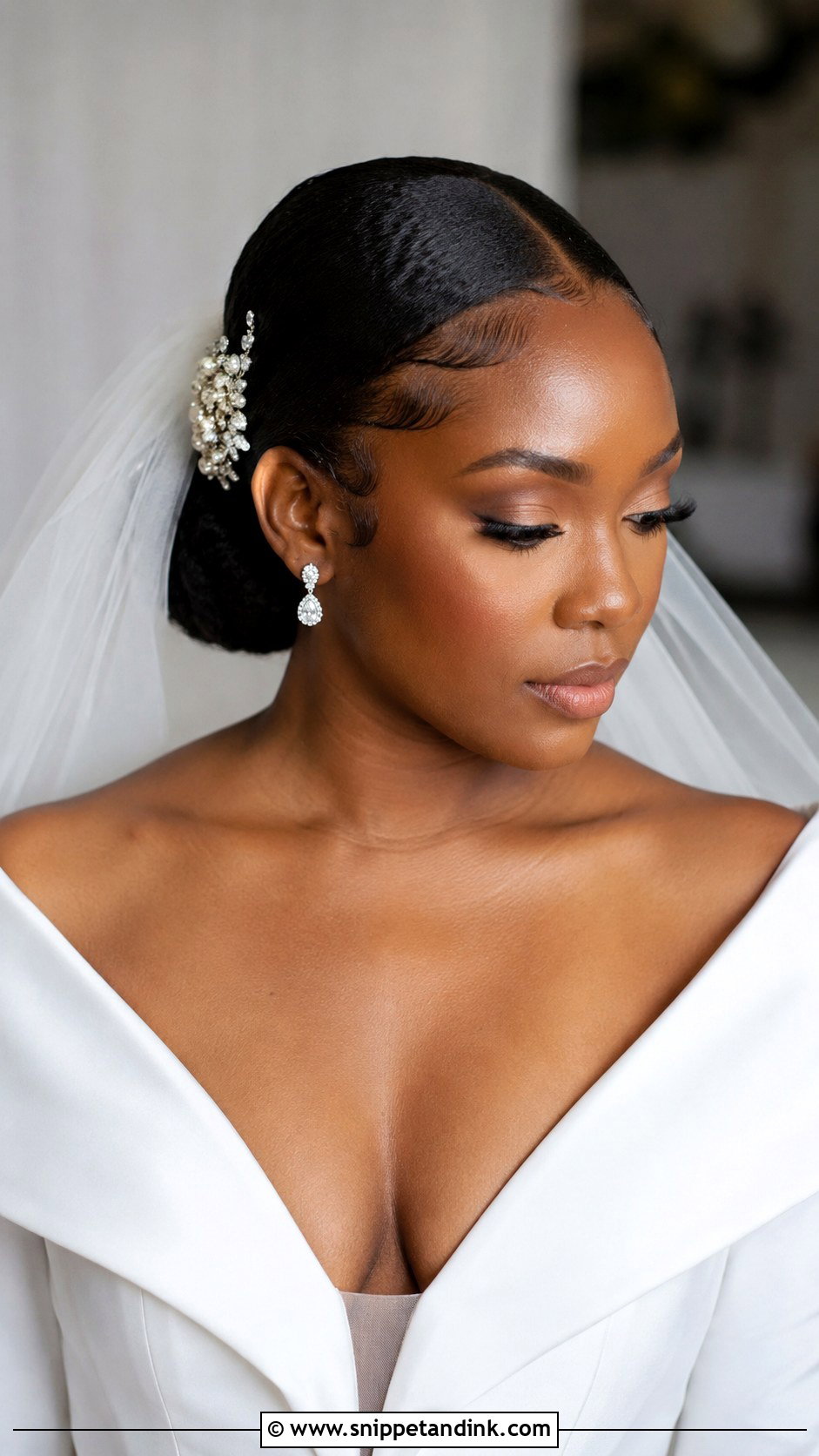 Sleek Low Bun With Edges - Snippet and Ink - 20 Afro Wedding Hairstyles Brides
