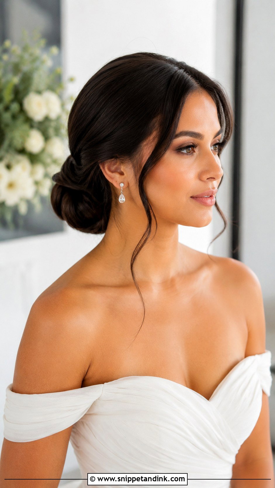 Sleek Low Bun With Face Framing Pieces - Snippet and Ink - 15 Sleek Low Bun Bridal Hair Ideas