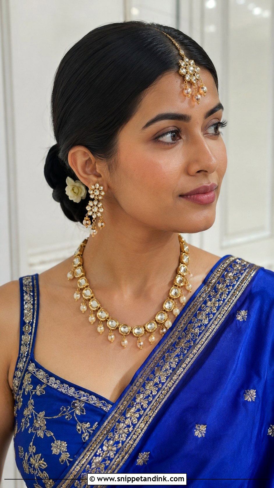 Sleek Low Bun With Maang Tikka - Snippet and Ink - 20 Indian Bridal Hair Ideas