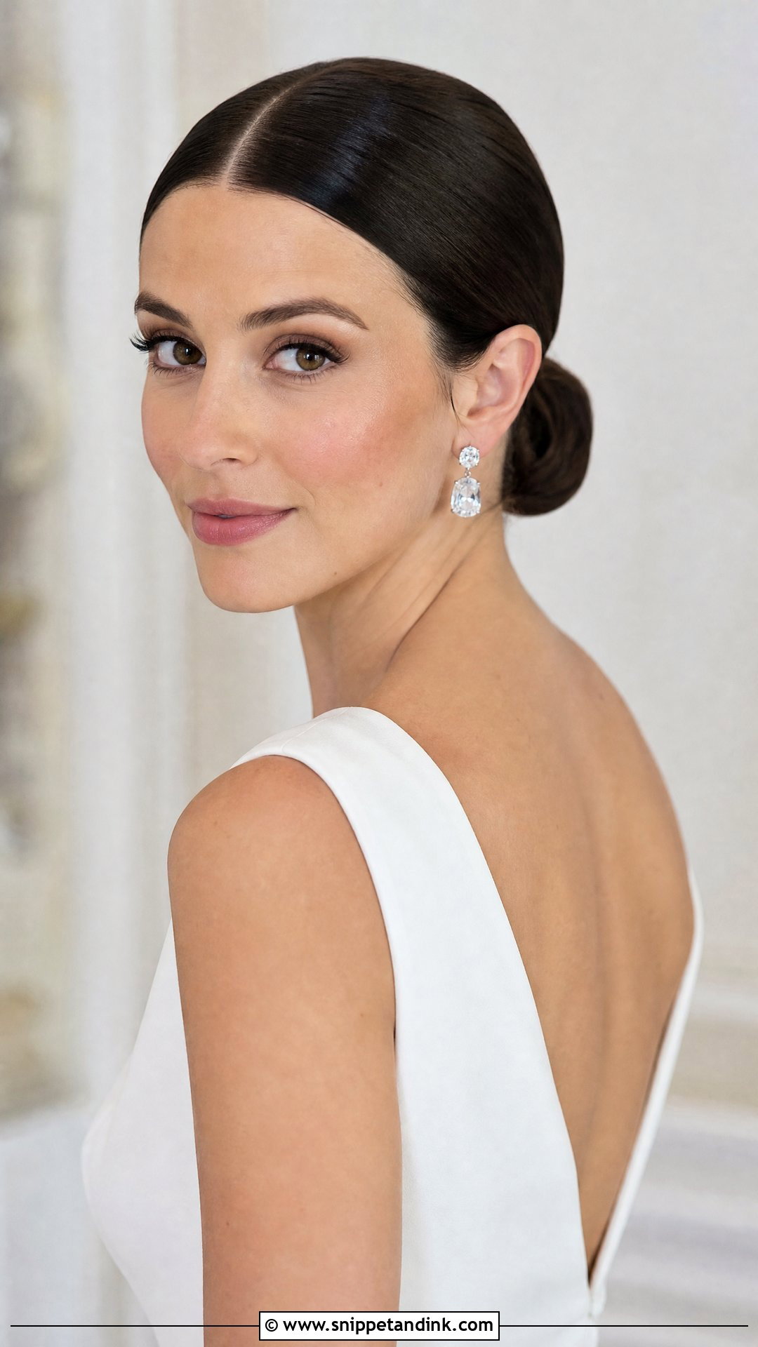 Sleek Low Bun With Middle Part - Snippet and Ink - 20 Hairstyle for Bridal Ideas
