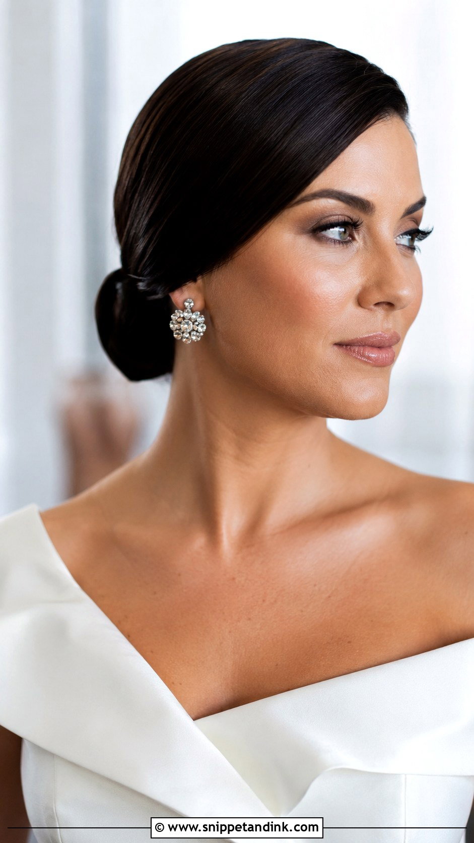 Sleek Low Bun With Side Part - Snippet and Ink - 30 Low Bun Bridal Hair Ideas