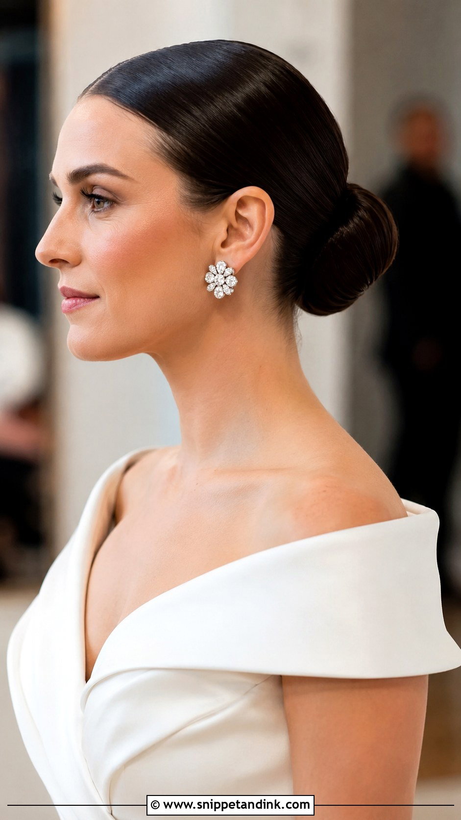 Sleek Low Bun With Slicked Back Hair - Snippet and Ink - 35 Low Bun Wedding Hair Ideas