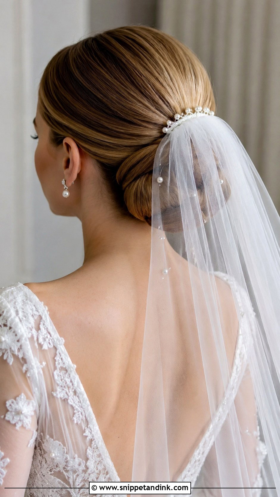 Sleek Low Bun With Veil - Snippet and Ink - 20 Pulled Back Wedding Hair Ideas