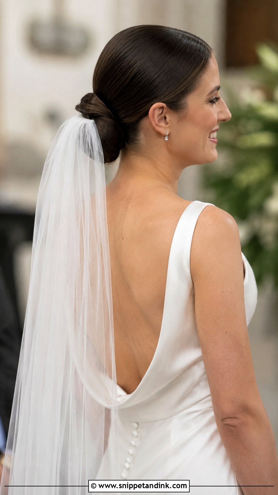 Sleek Low Bun With Veil - Snippet and Ink - 35 Low Bun Wedding Hair Ideas