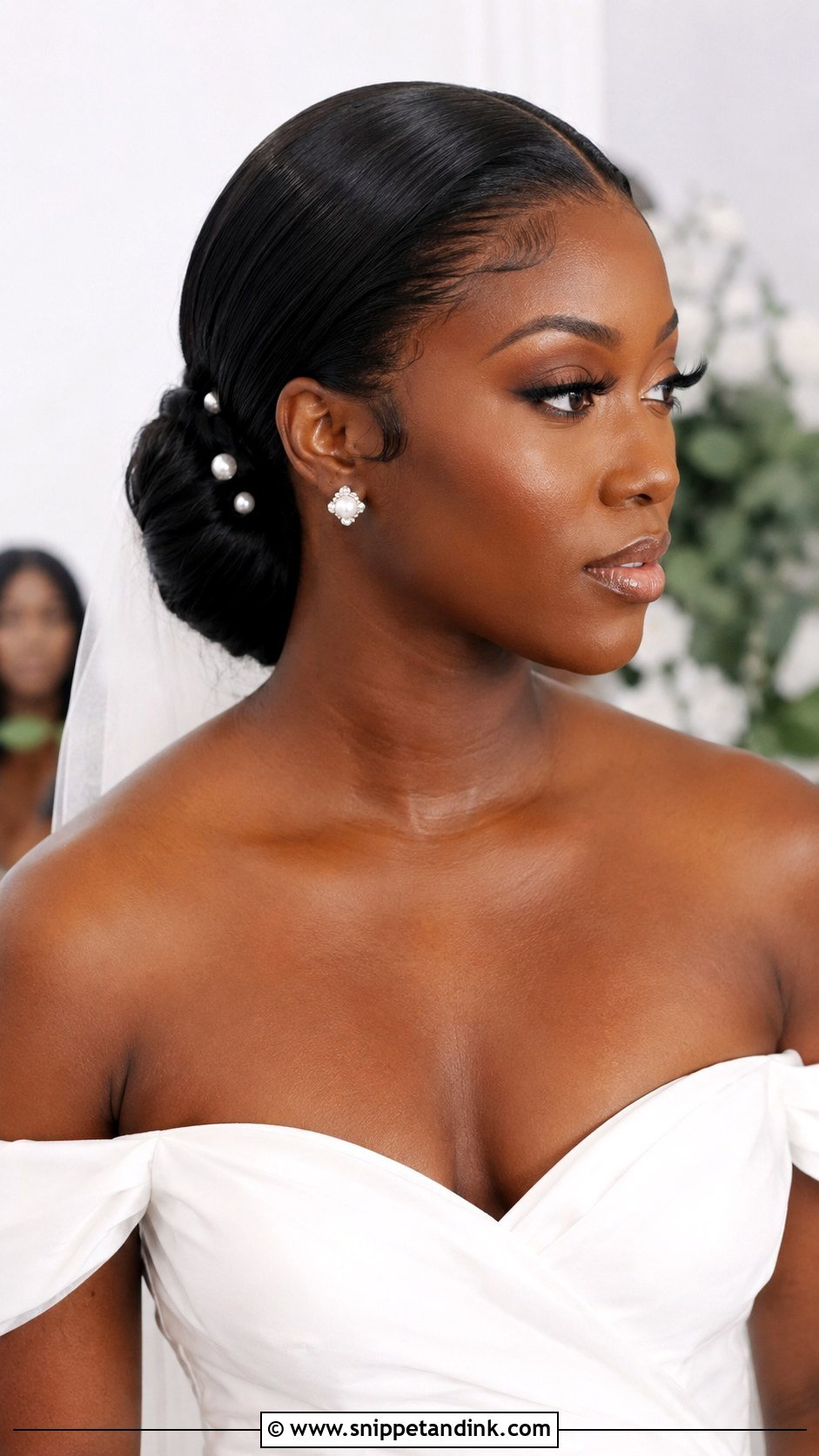Sleek Low Bun for Black Brides - Snippet and Ink - 25 Black Wedding Hairstyles for Bride