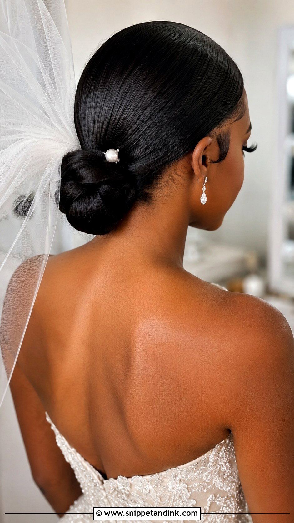 Sleek Low Bun for Black Brides - Snippet and Ink - 20 Black Brides Hairstyles Weddings