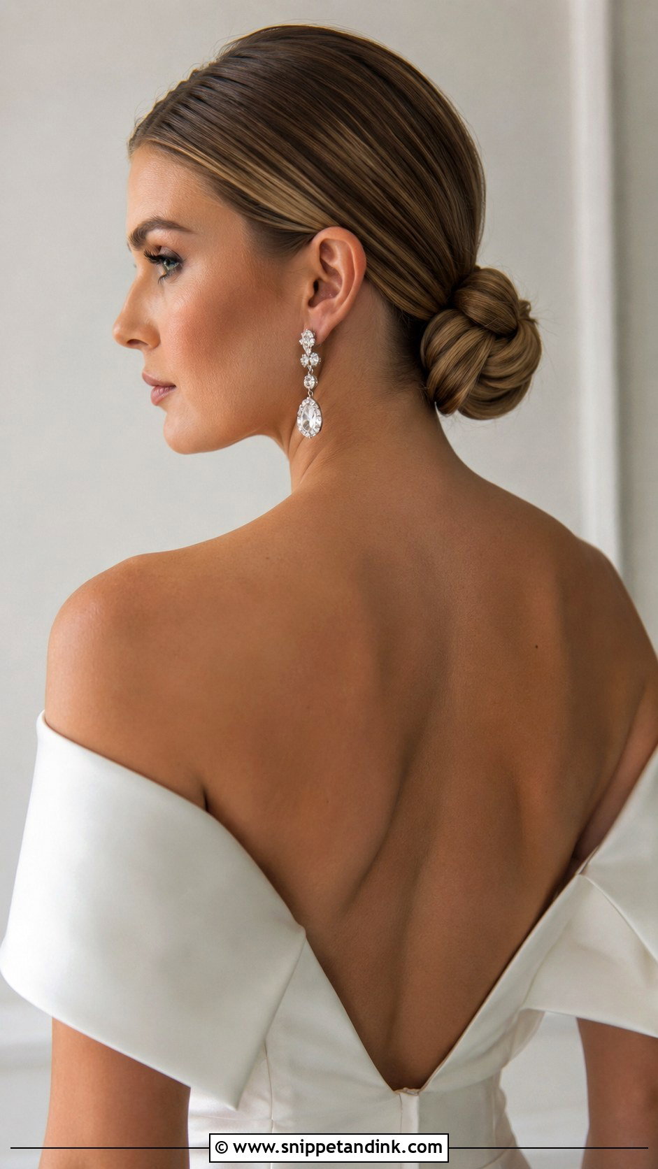 Sleek Low Bun for Brides - Snippet and Ink - 20 Long Hair for Wedding Ideas