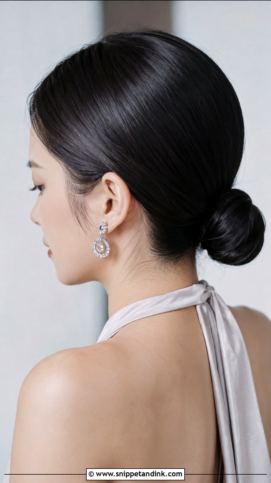 Sleek Low Bun for Engagement - Snippet and Ink - 20 Hairstyle for Engagement Look Ideas