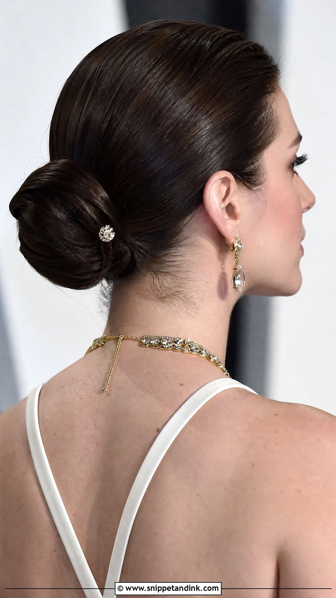 Sleek Low Knot - Snippet and Ink - 20 Easy Short Hair Wedding Guest Updo Ideas
