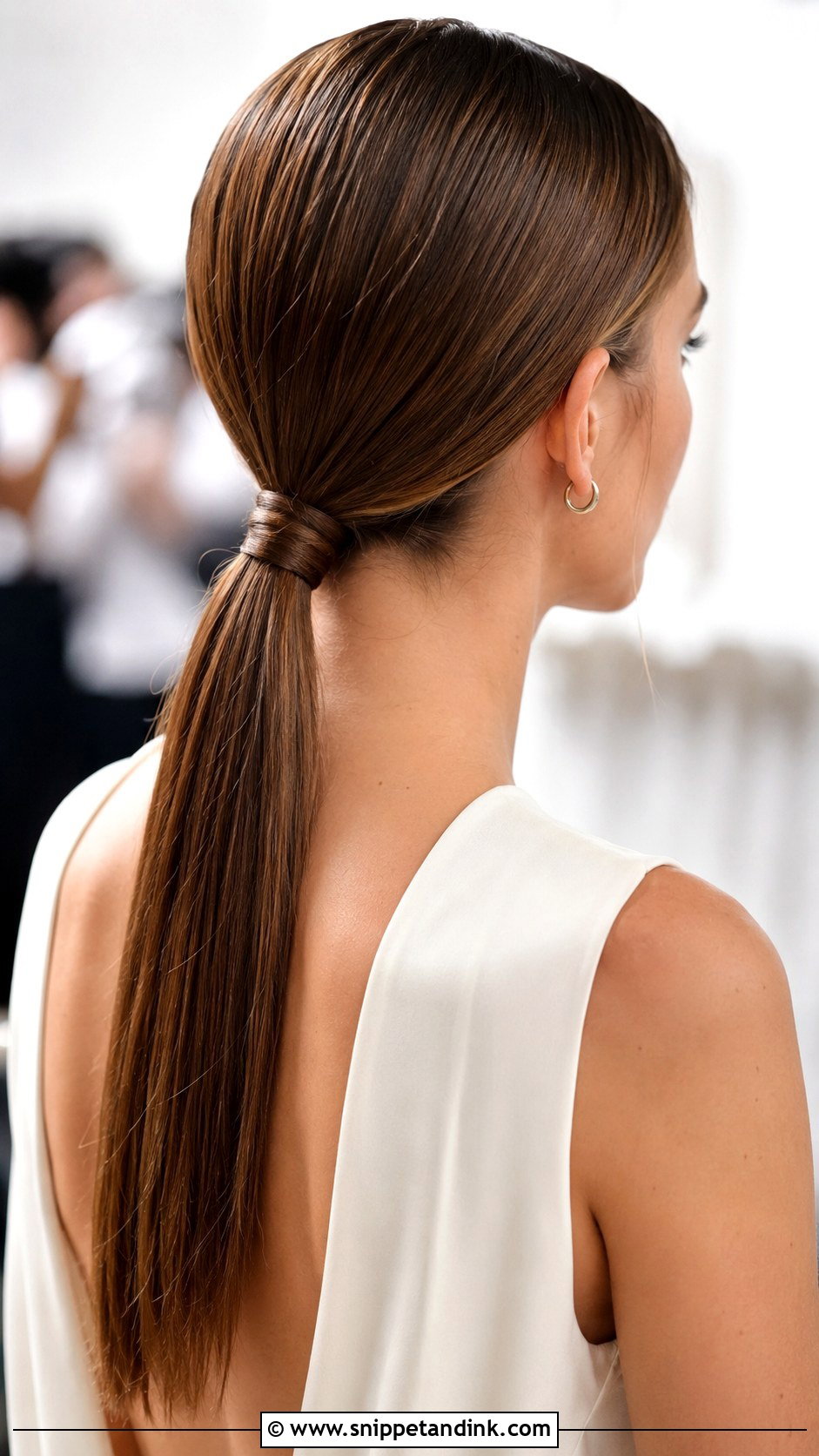 Sleek Low Ponytail - Snippet and Ink - 30 Wedding Guest Hairstyle Ideas