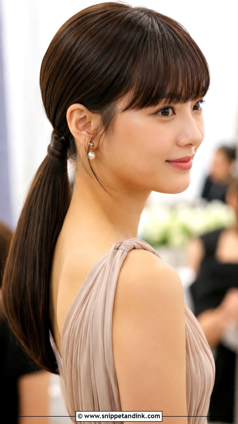 Sleek Low Ponytail With Bangs - Snippet and Ink - 25 Bridesmaid Hairstyles with Bangs