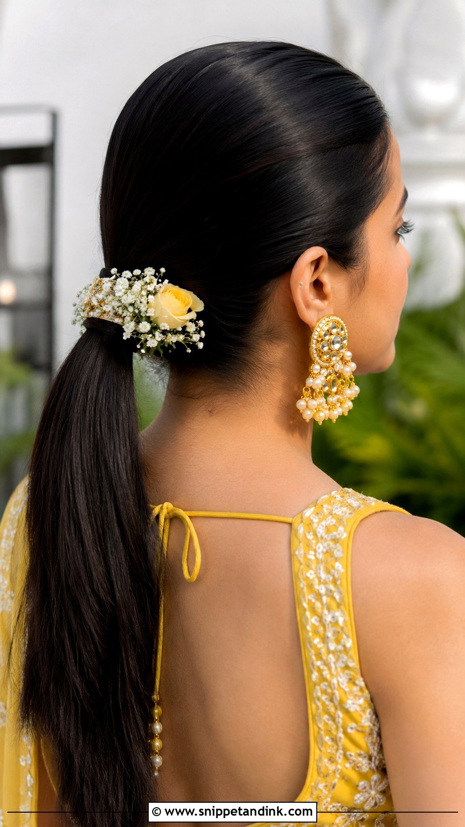 Sleek Low Ponytail With Flowers - Snippet and Ink - 25 Haldi Bride Hairstyle Ideas