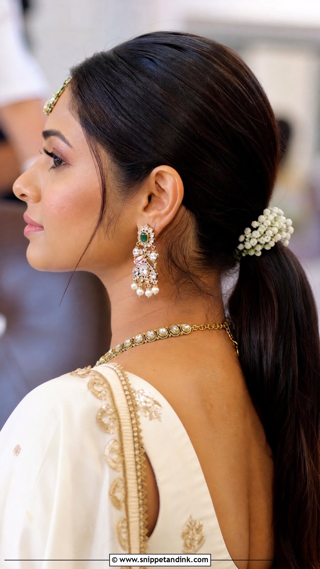Sleek Low Ponytail With Flowers - Snippet and Ink - 30 Kerala Bride Hairstyles