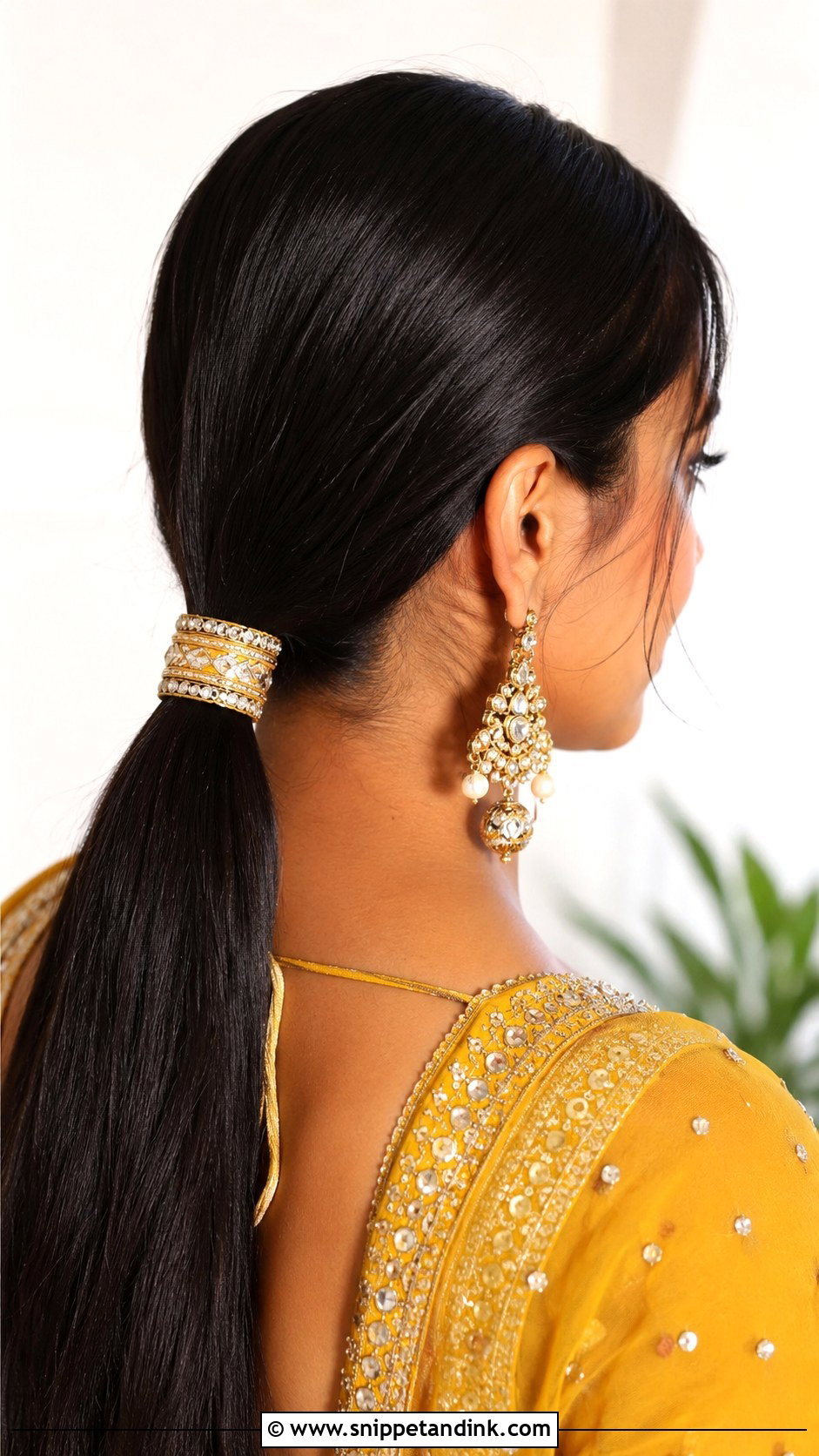 Sleek Low Ponytail With Hair Accessory - Snippet and Ink - 25 Mehndi Hairstyles for Bride Sister