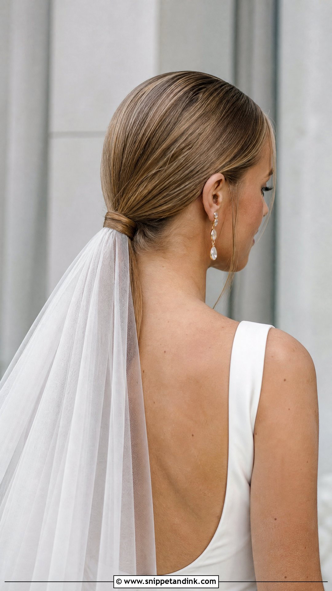 Sleek Low Ponytail With Veil - Snippet and Ink - 20 Hair with Veil Ideas